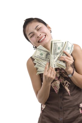 woman-with-money-held-close